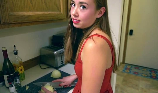 A girl in a red dress in the kitchen is ready for hard home sex with a friend
